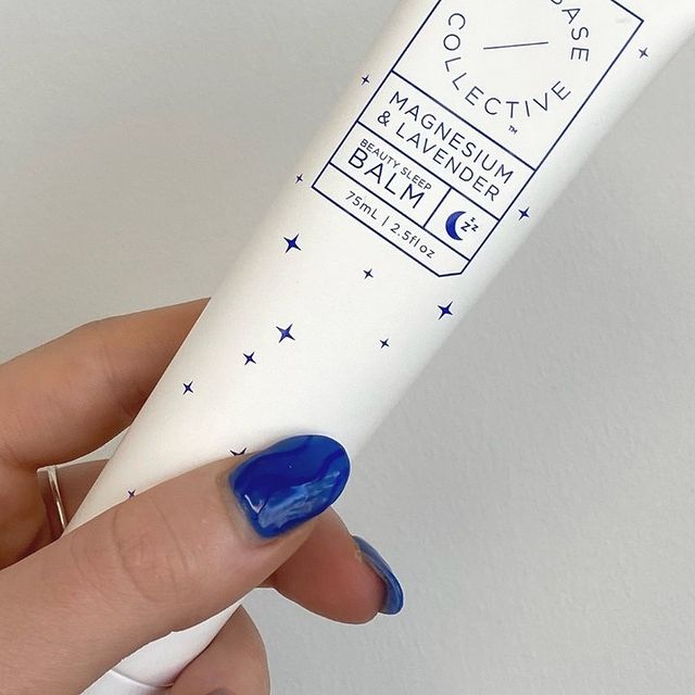 Magnesium Cream for sleep, Beauty Sleep Balm in hand with blue nail polish