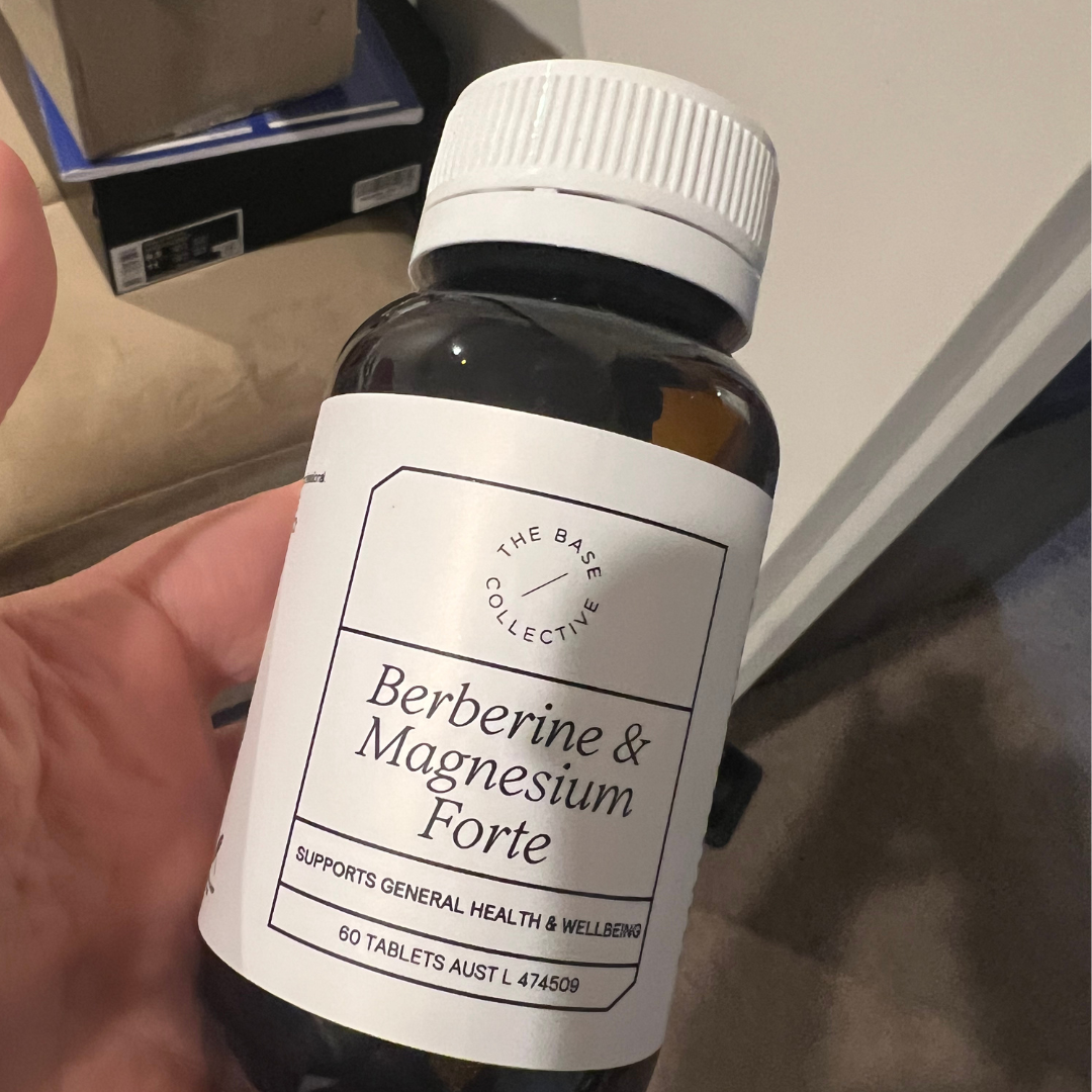 Berberine & Magnesium Glycinate tablets in hand