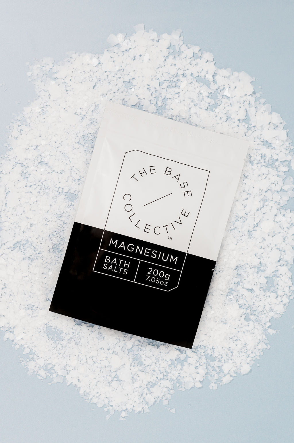 Pure Magnesium Chloride Flakes on the top of The Base Collective Packet of Magnesium Bath Flakes 200g