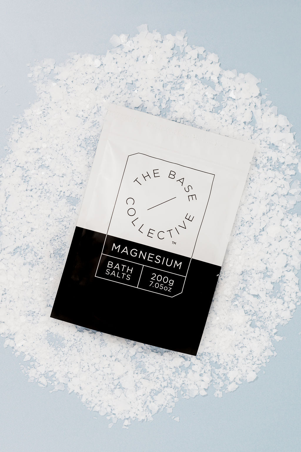 Pure Magnesium Chloride Flakes on the top of The Base Collective Packet of Magnesium Bath Flakes 200g