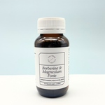 Berberine & Magnesium Glycinate Tablets on light blue background