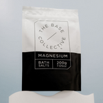 Magnesium Chloride Pure packet on a blue background and white wavy stand