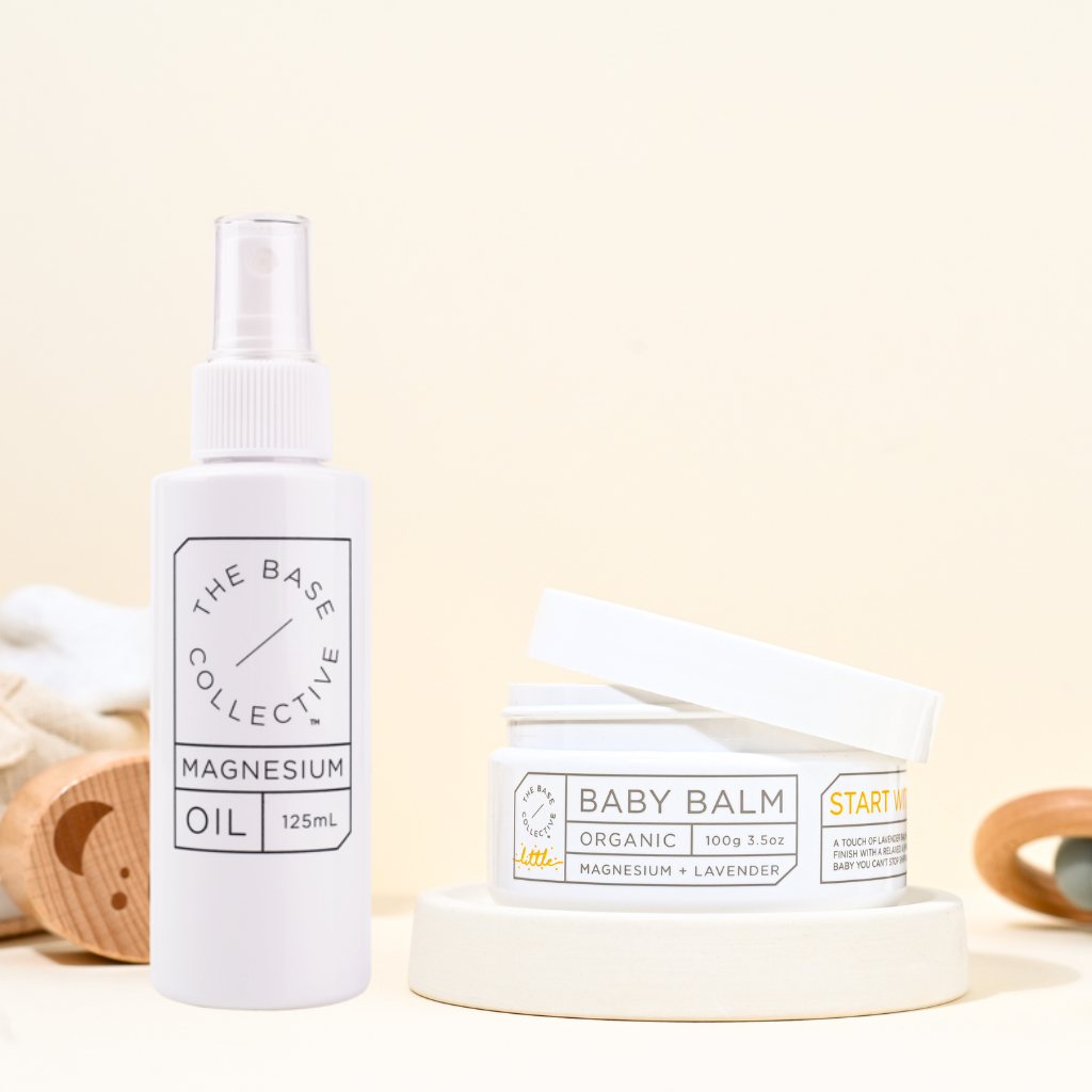 Kids Magnesium Spray bundle on yellow background with lid open on cream