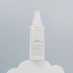 Lavender Sleep Spray by The Base Collective on a cloud against a light blue background