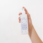 Magnesium Body Wash with Lavender and Chamomile, Beauty Sleep Wash by The Base Collective in hand 