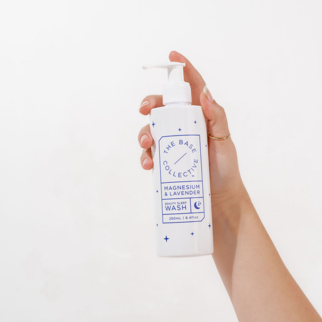 Magnesium Body Wash with Lavender and Chamomile, Beauty Sleep Wash by The Base Collective in hand with gold ring on thumb 